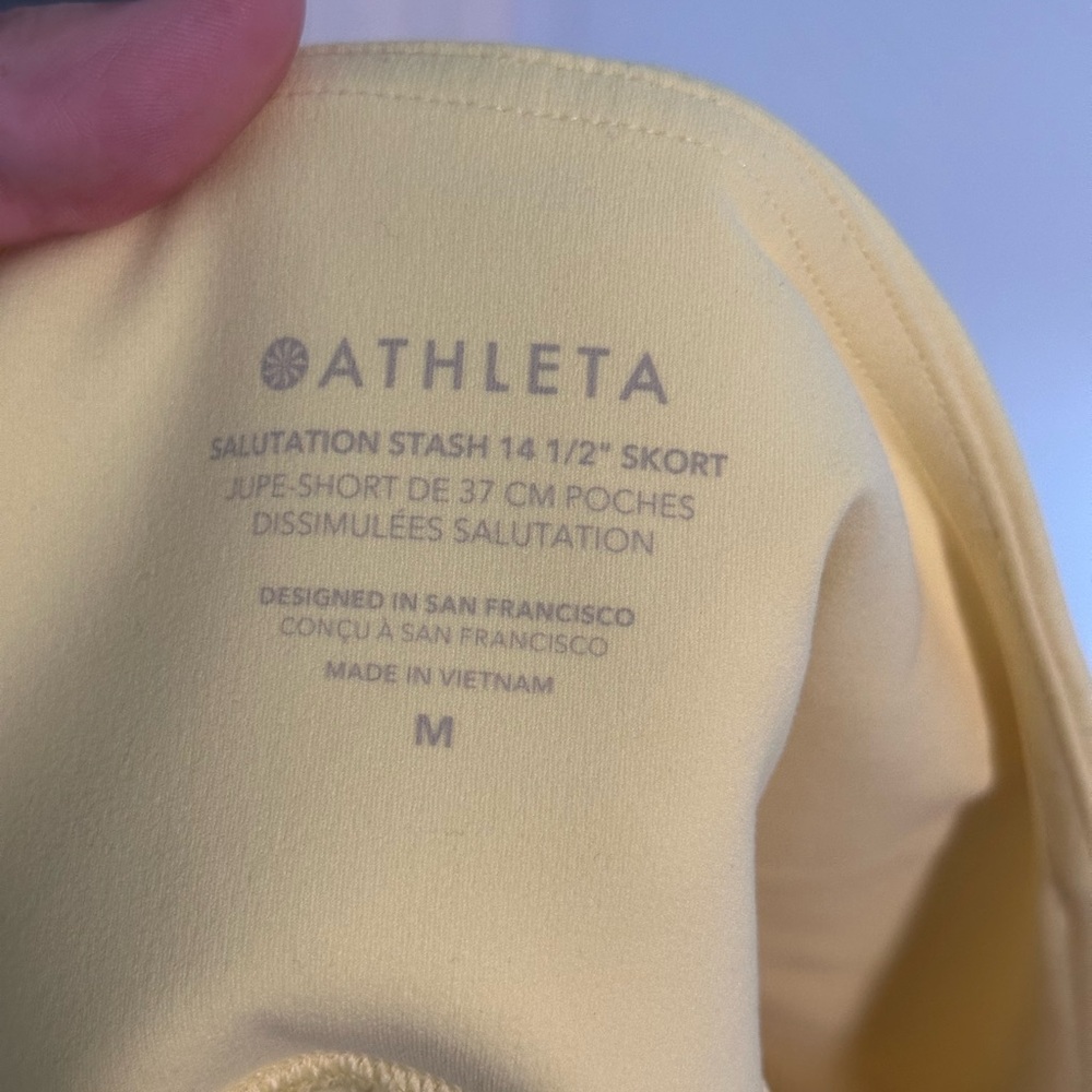 Yellow Athleta Salutation Stash skort 14.5” long - Picture 3 of 4